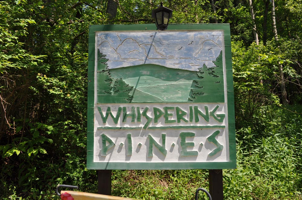 Whispering Pines sign